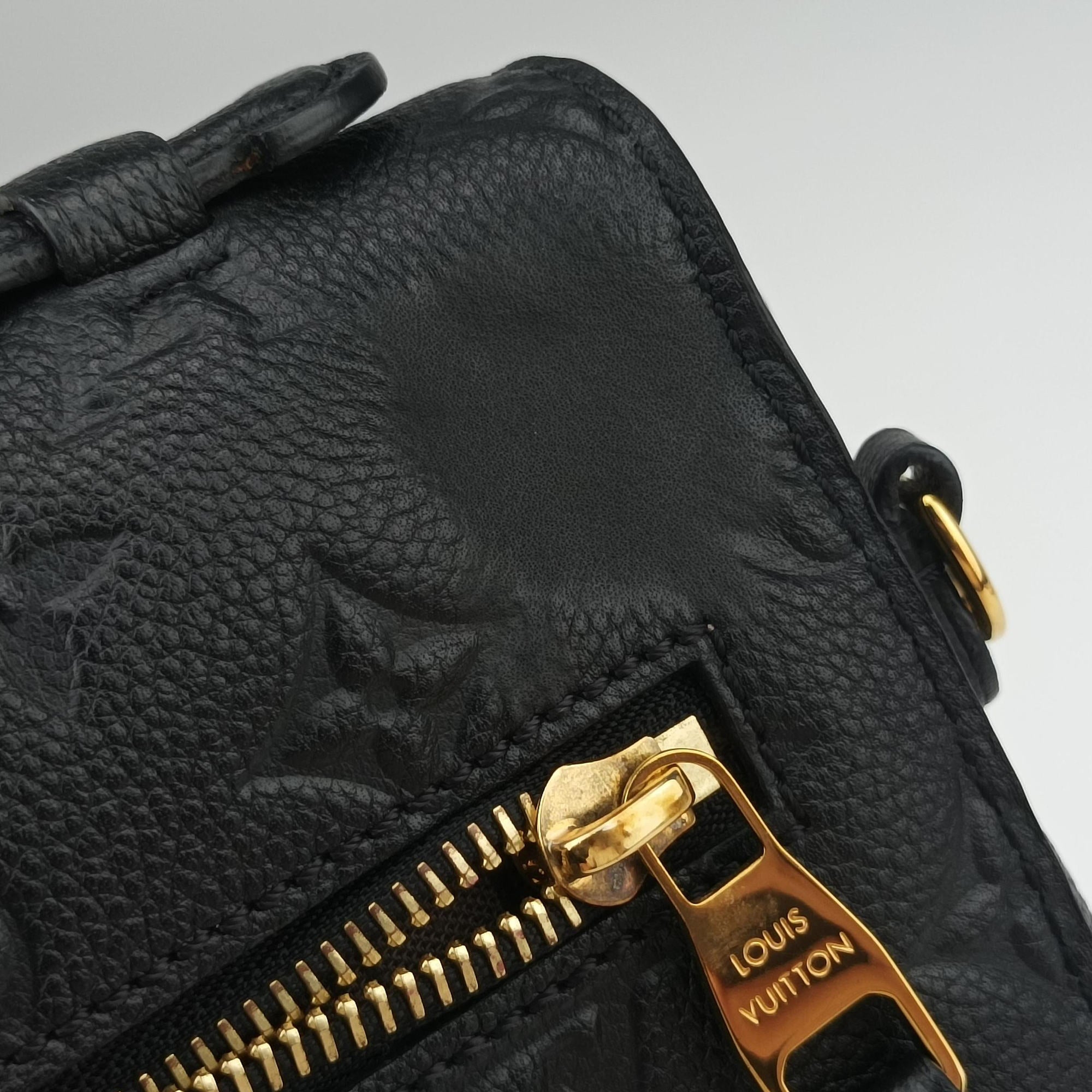 Vintage Louis Vuitton Pochette MeTIS MM Noir Monogram Empreinte M41487 handbag | stylenewstar