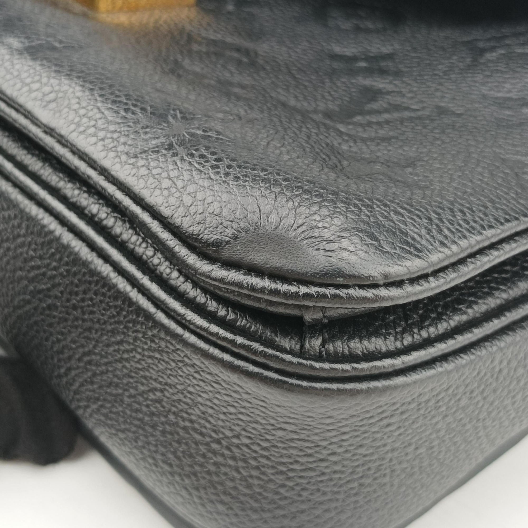 Vintage Louis Vuitton Pochette MeTIS MM Noir Monogram Empreinte M41487 handbag | stylenewstar
