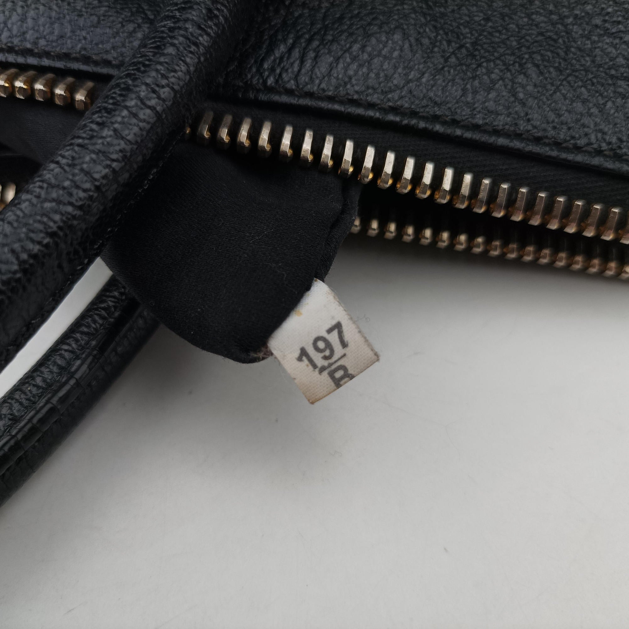 Vintage Miu Miu Madras Black Leather RN1016 handbag | stylenewstar