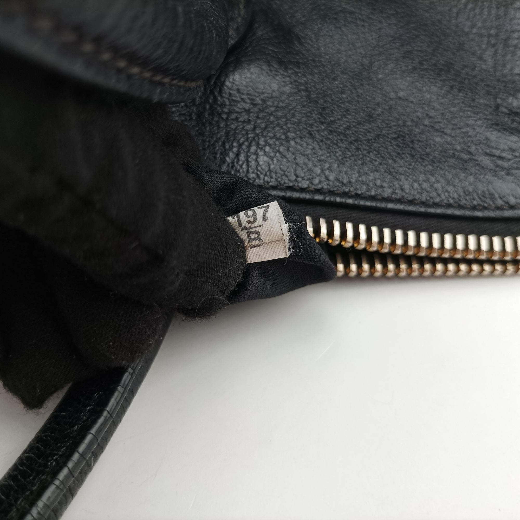 Vintage Miu Miu Madras Black Leather RN1016 handbag | stylenewstar