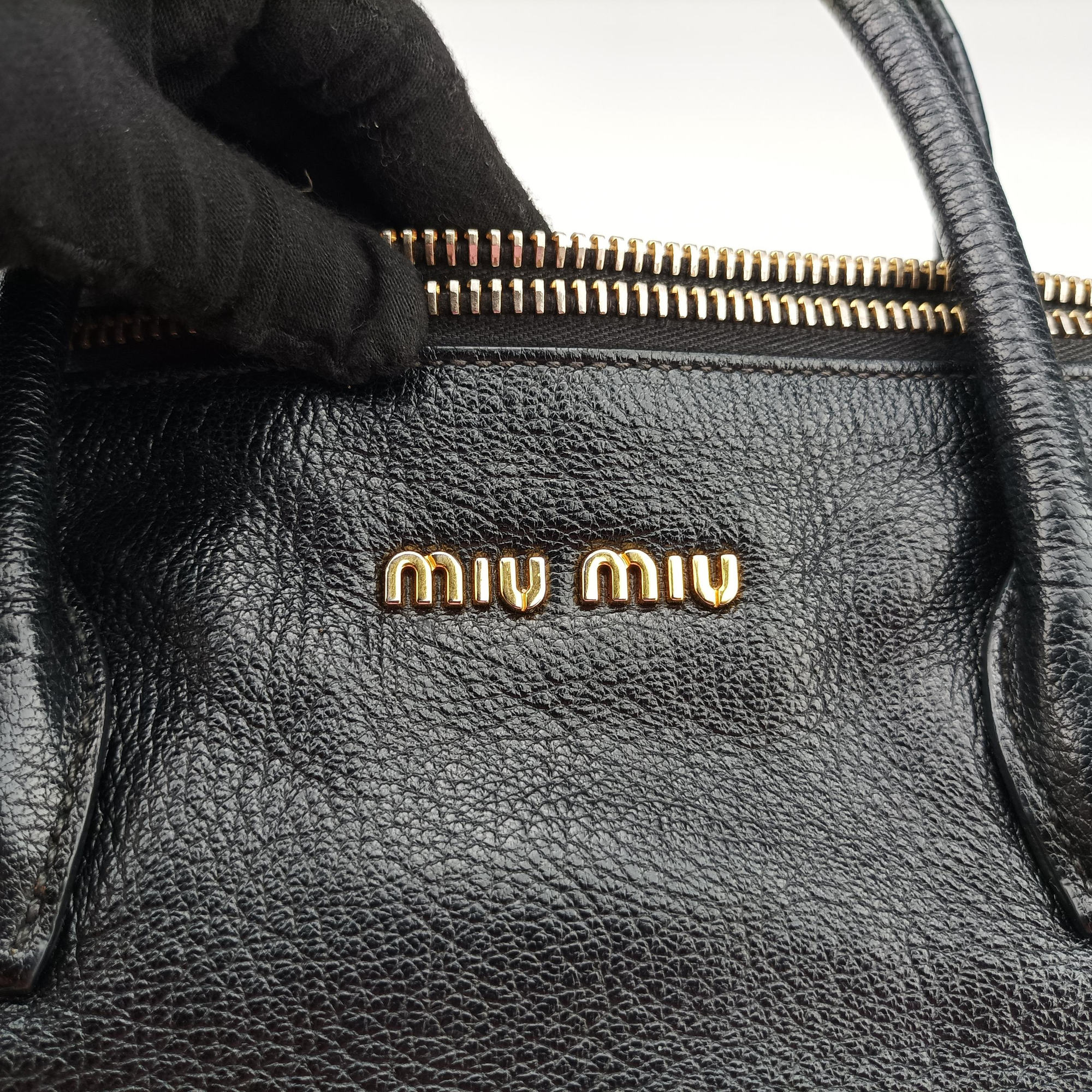 Vintage Miu Miu Madras Black Leather RN1016 handbag | stylenewstar