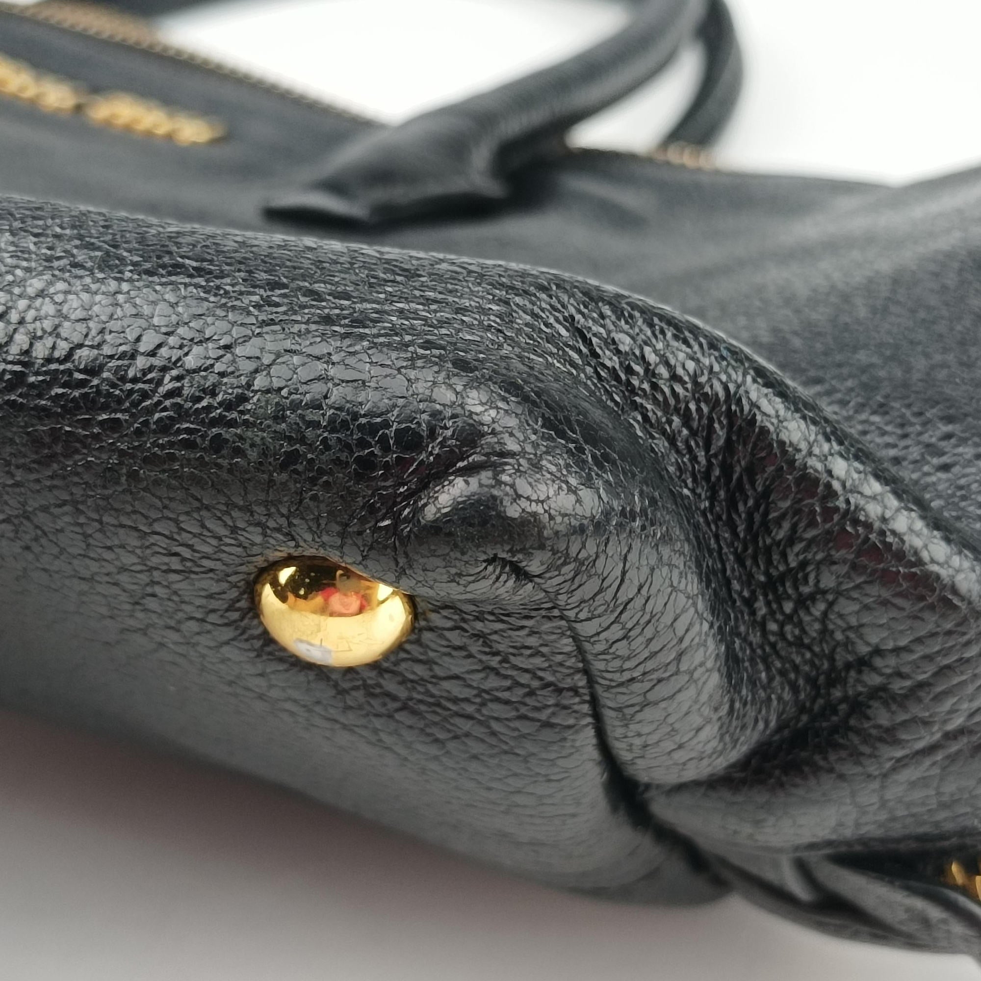 Vintage Miu Miu Madras Black Leather RN1016 handbag | stylenewstar