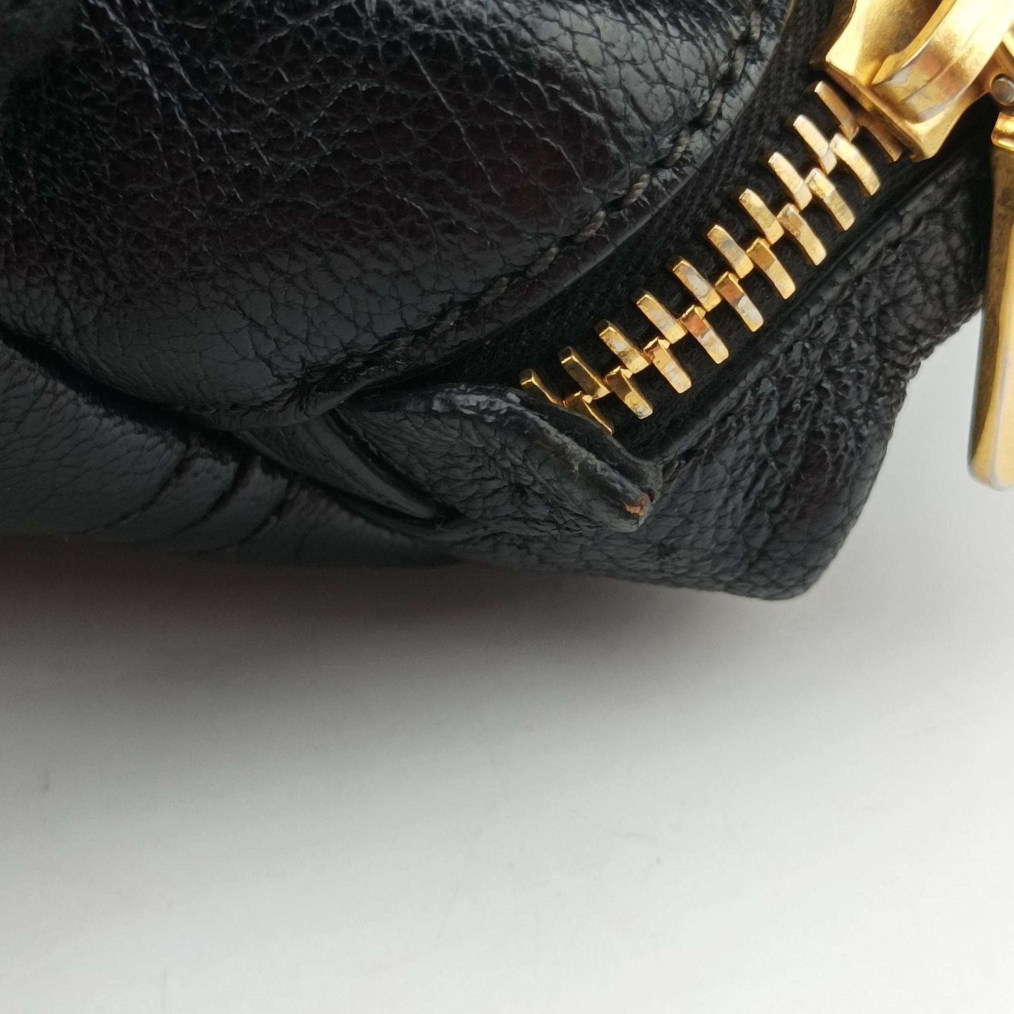 Vintage Miu Miu Madras Black Leather RN1016 handbag | stylenewstar
