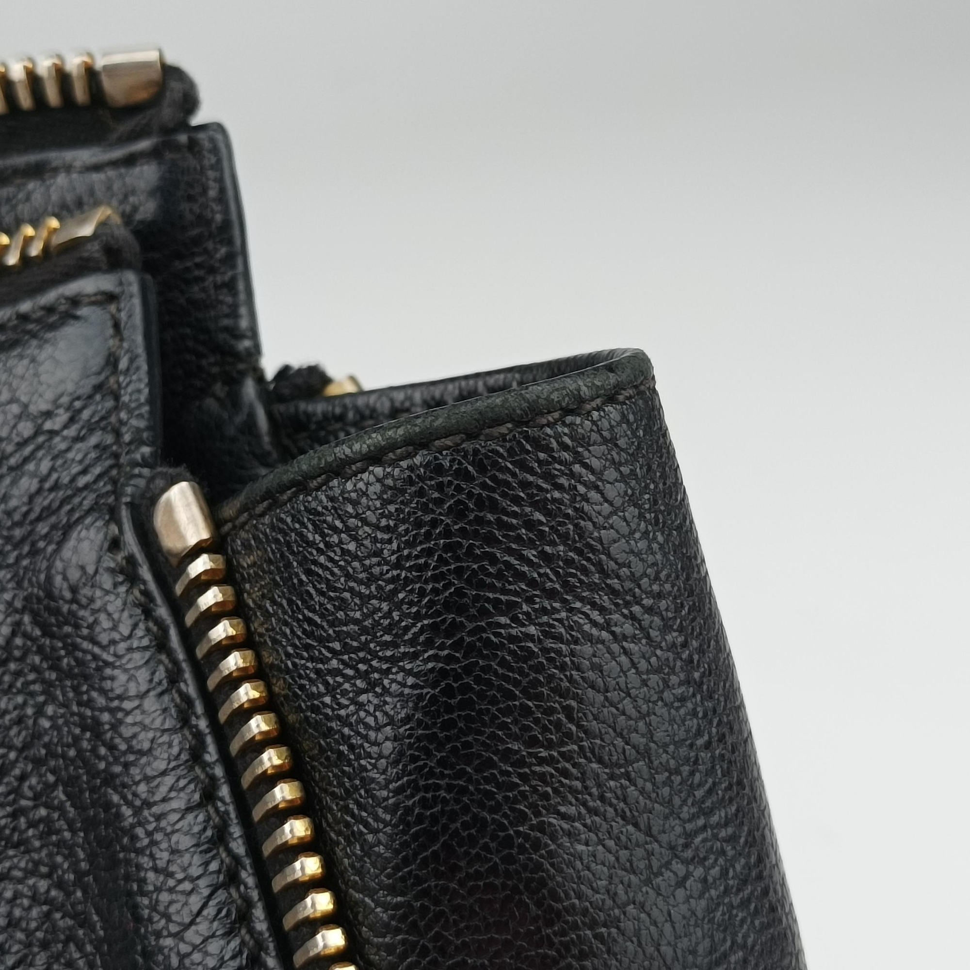 Vintage Miu Miu Madras Black Leather RN1016 handbag | stylenewstar