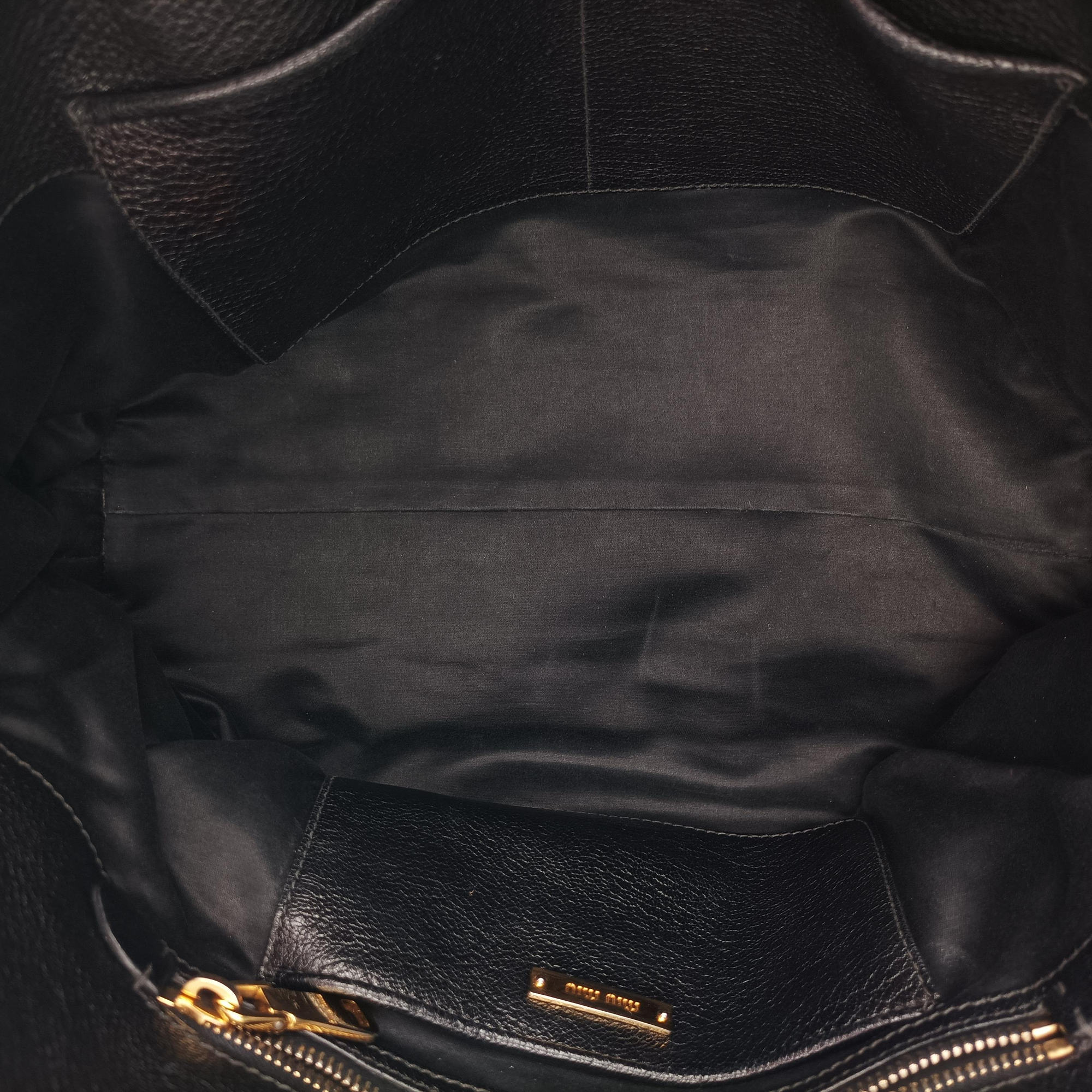 Vintage Miu Miu Madras Black Leather RN1016 handbag | stylenewstar