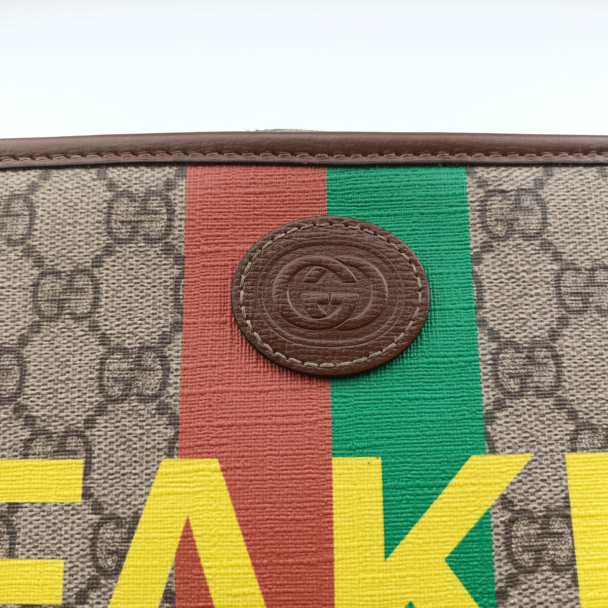 Pre-owned Gucci Fake/Not GG Supreme Brown PVC coated canvas 636243 clutchbag | stylenewstar
