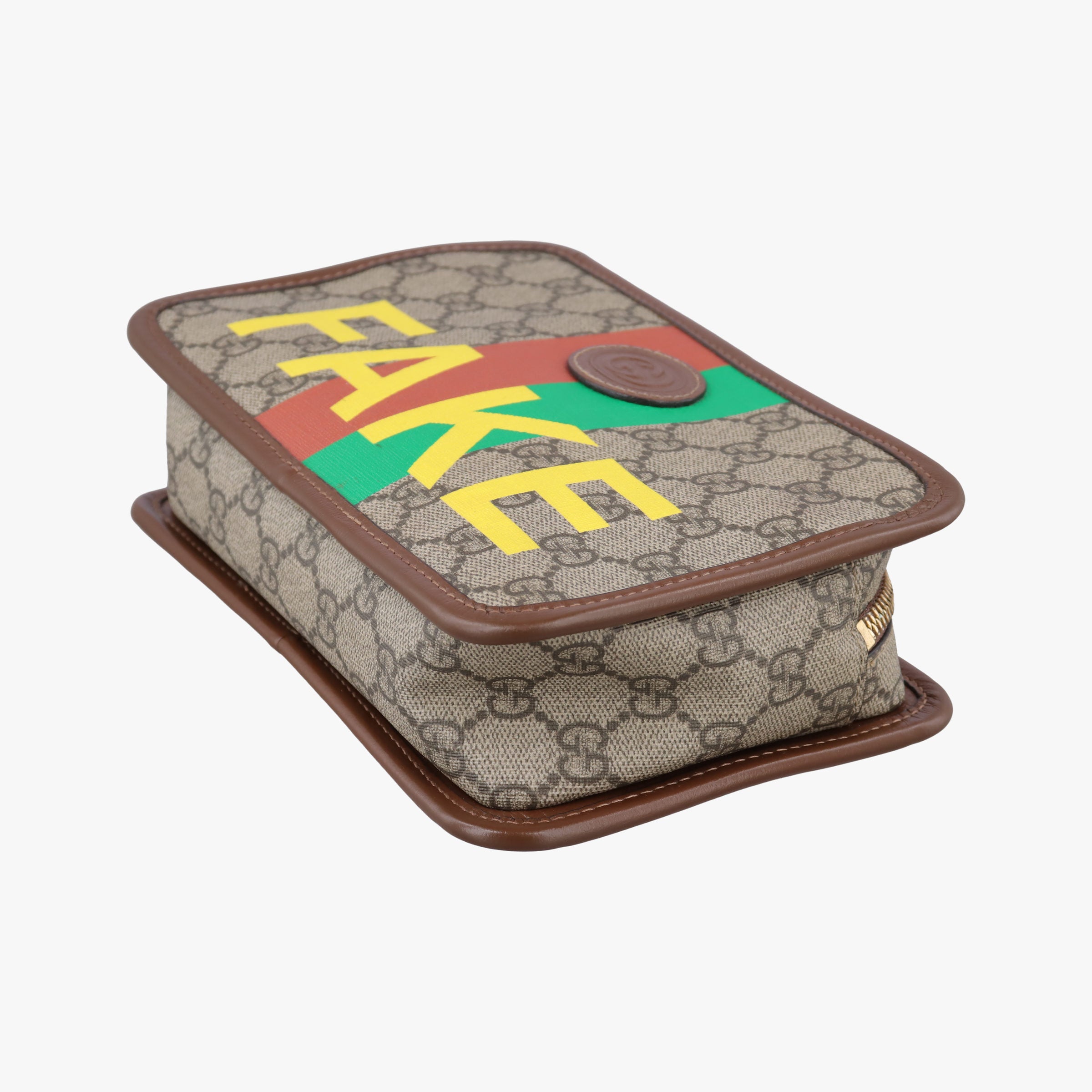 Pre-owned Gucci Fake/Not GG Supreme Brown PVC coated canvas 636243 clutchbag | stylenewstar