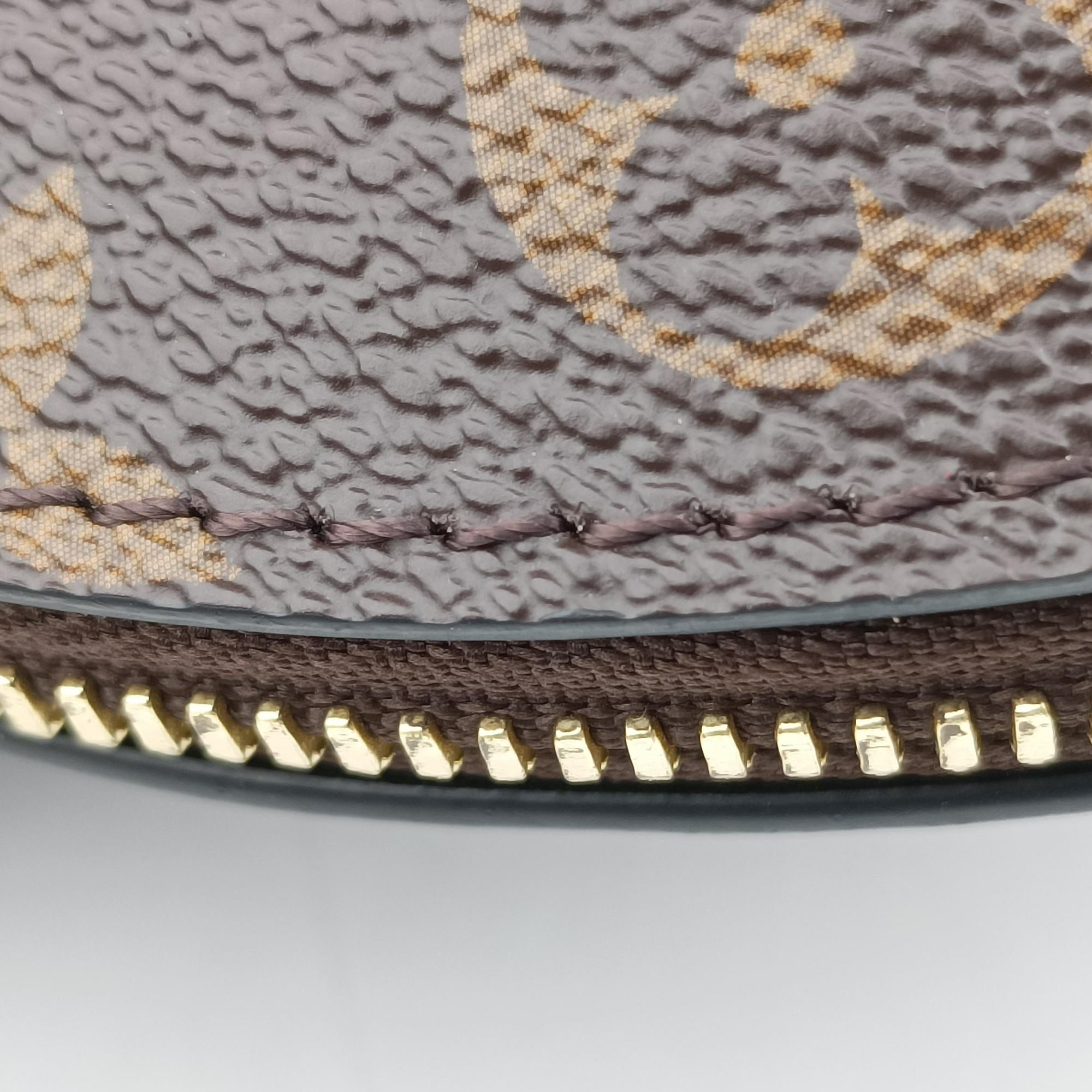 Pre-owned Louis Vuitton Toupie Marron Monogram Coated Canvas × Calfskin Leather M44592 clutchbag | stylenewstar