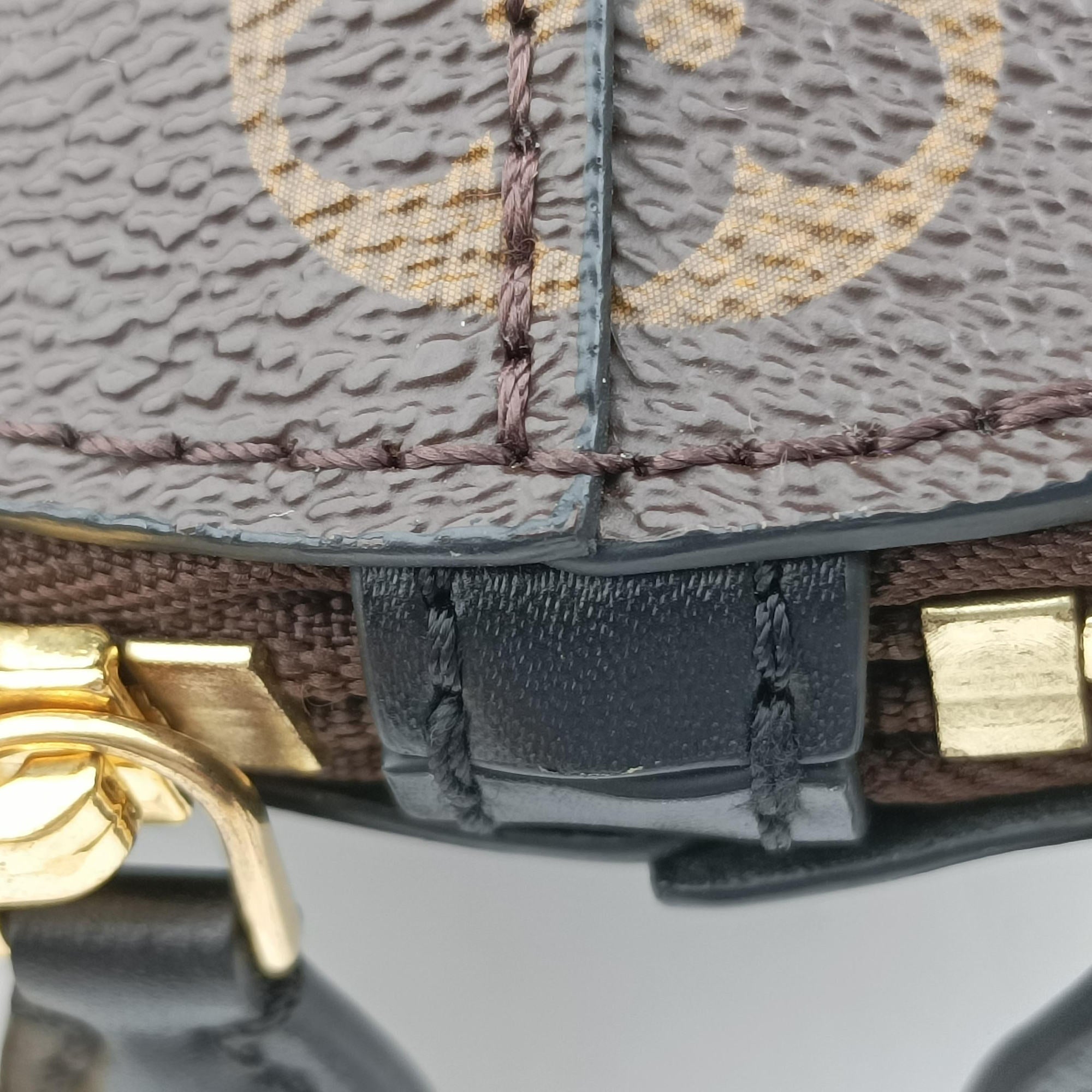 Pre-owned Louis Vuitton Toupie Marron Monogram Coated Canvas × Calfskin Leather M44592 clutchbag | stylenewstar