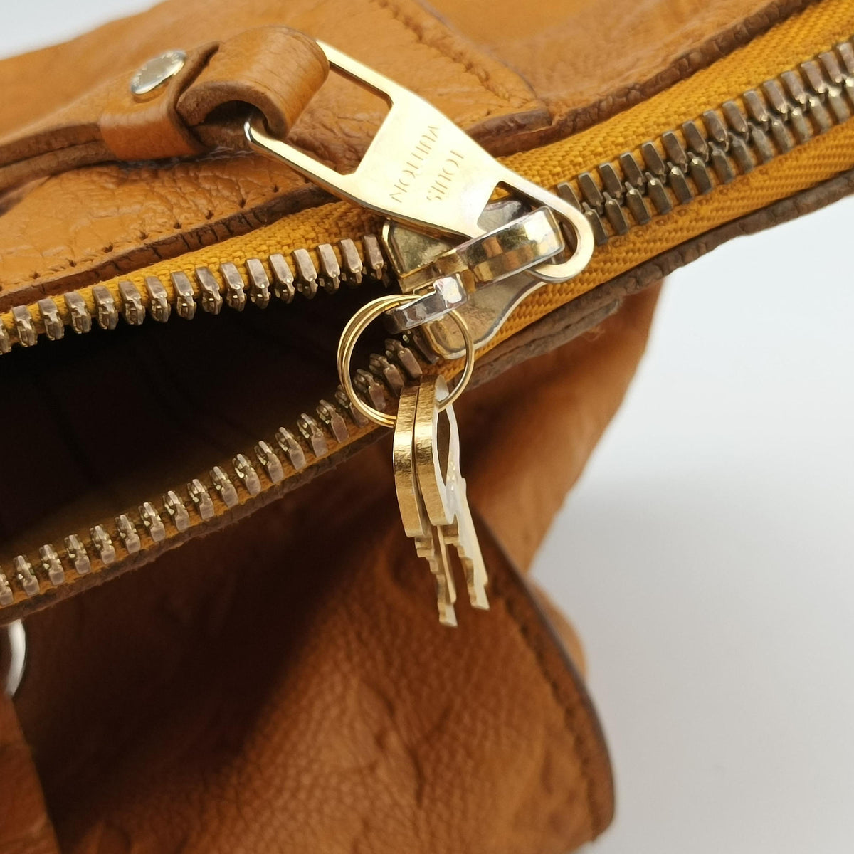 Secondhand Louis Vuitton Lumineuse PM saffron Monogram Empreinte M94324 shoulderbag | stylenewstar