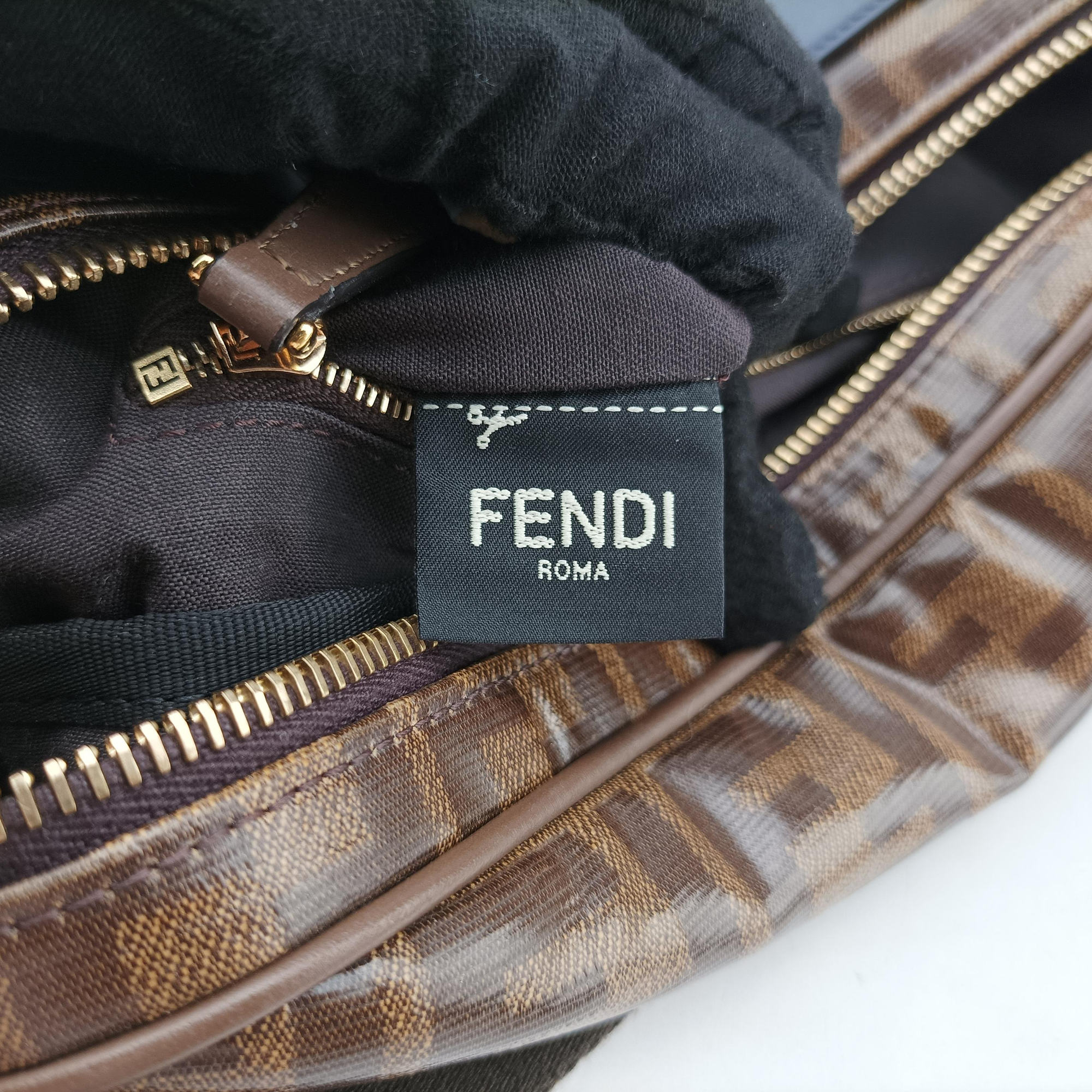 Pre-owned Fendi Fila Collaboration Zucca Pattern Logomania Brown PVC coated canvas 7VA434 bum bag/waist bag | stylenewstar