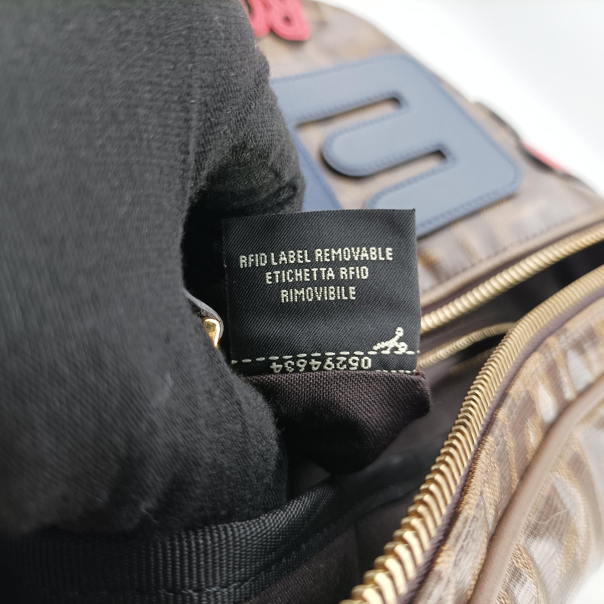 Pre-owned Fendi Fila Collaboration Zucca Pattern Logomania Brown PVC coated canvas 7VA434 bum bag/waist bag | stylenewstar