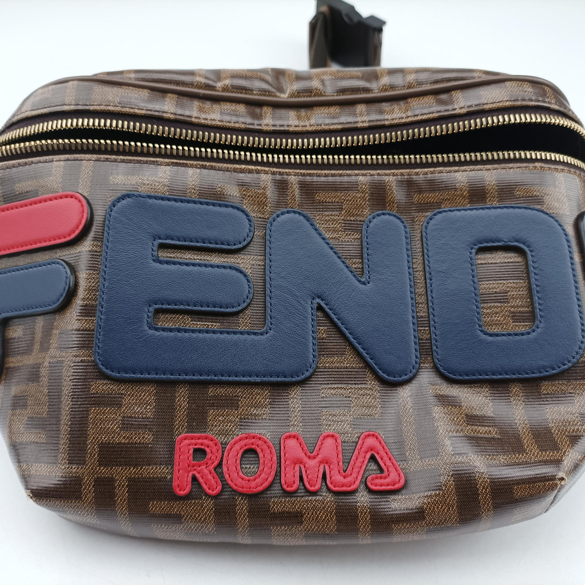 Pre-owned Fendi Fila Collaboration Zucca Pattern Logomania Brown PVC coated canvas 7VA434 bum bag/waist bag | stylenewstar