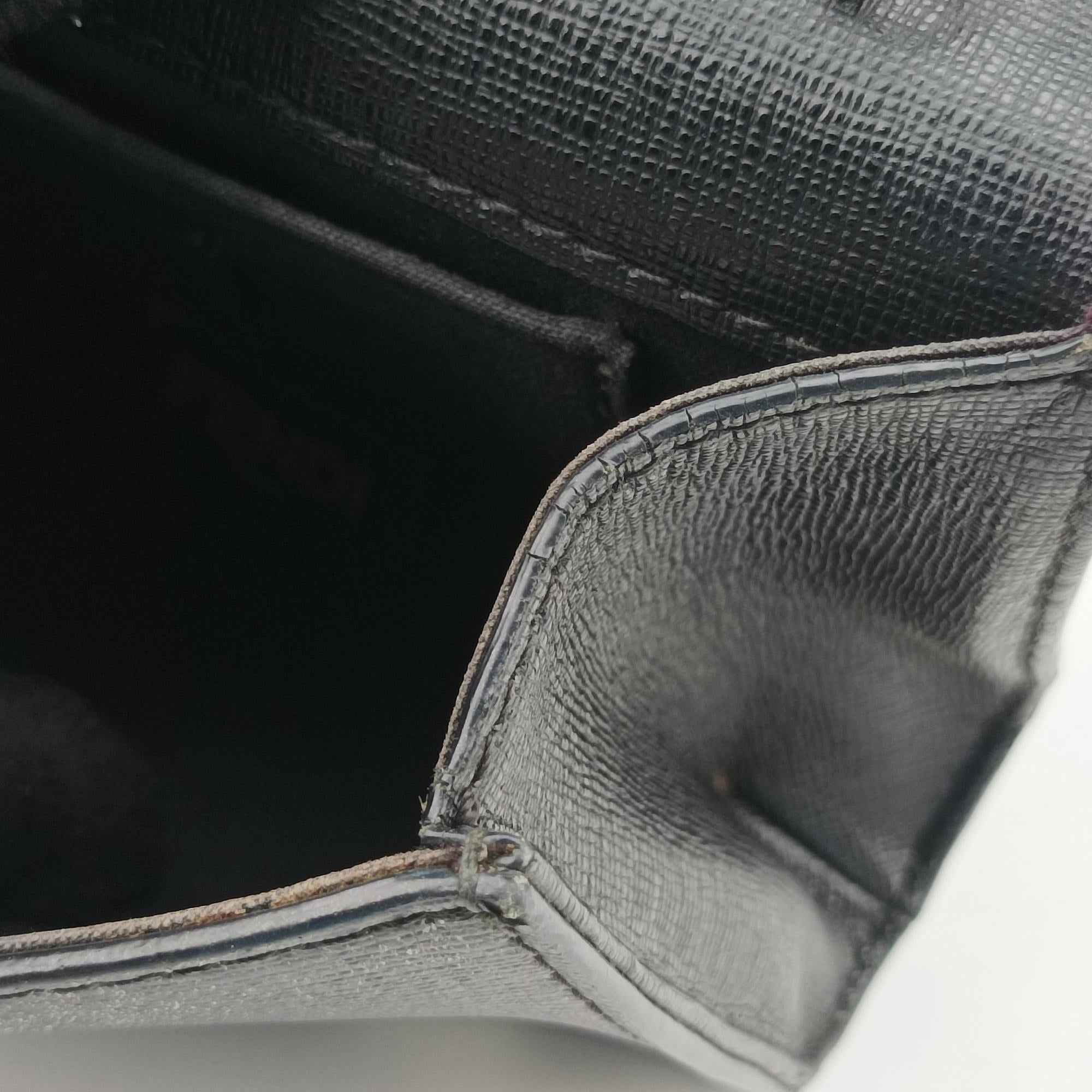 Vintage Fendi Monster Eyes Continental Black Leather 8M0322 shoulderbag | stylenewstar