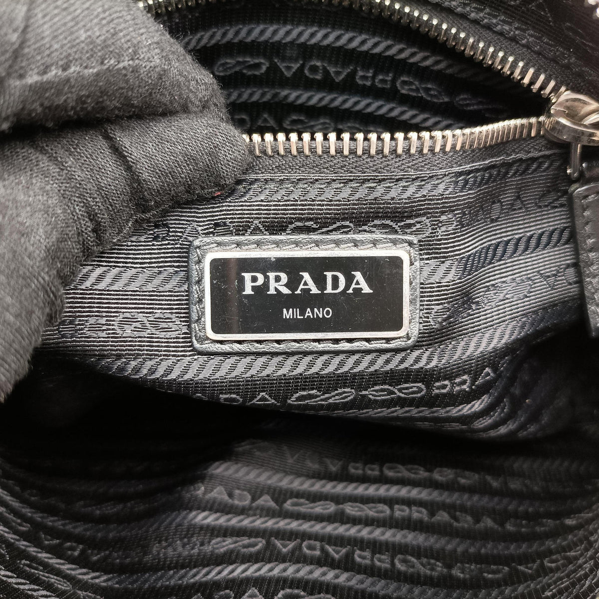 Secondhand Prada Triangle Logo White Saffiano Leather 2VL012 bum bag/waist bag | stylenewstar