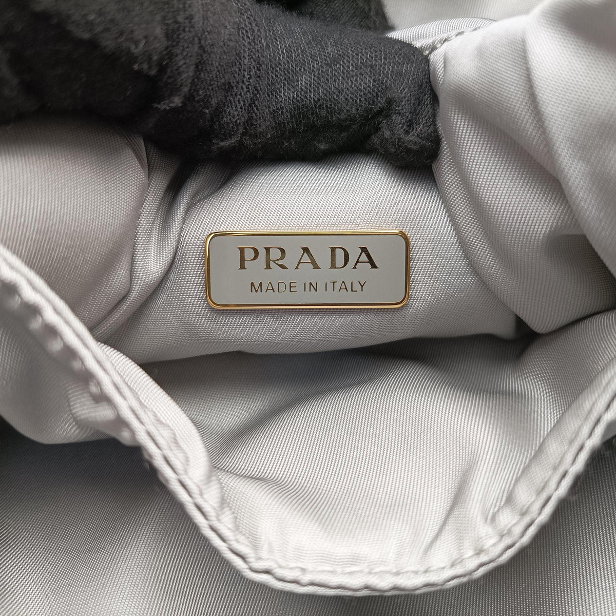 Secondhand Prada Ribbon Re-Nylon Grey Nylon 1BA359 shoulderbag | stylenewstar