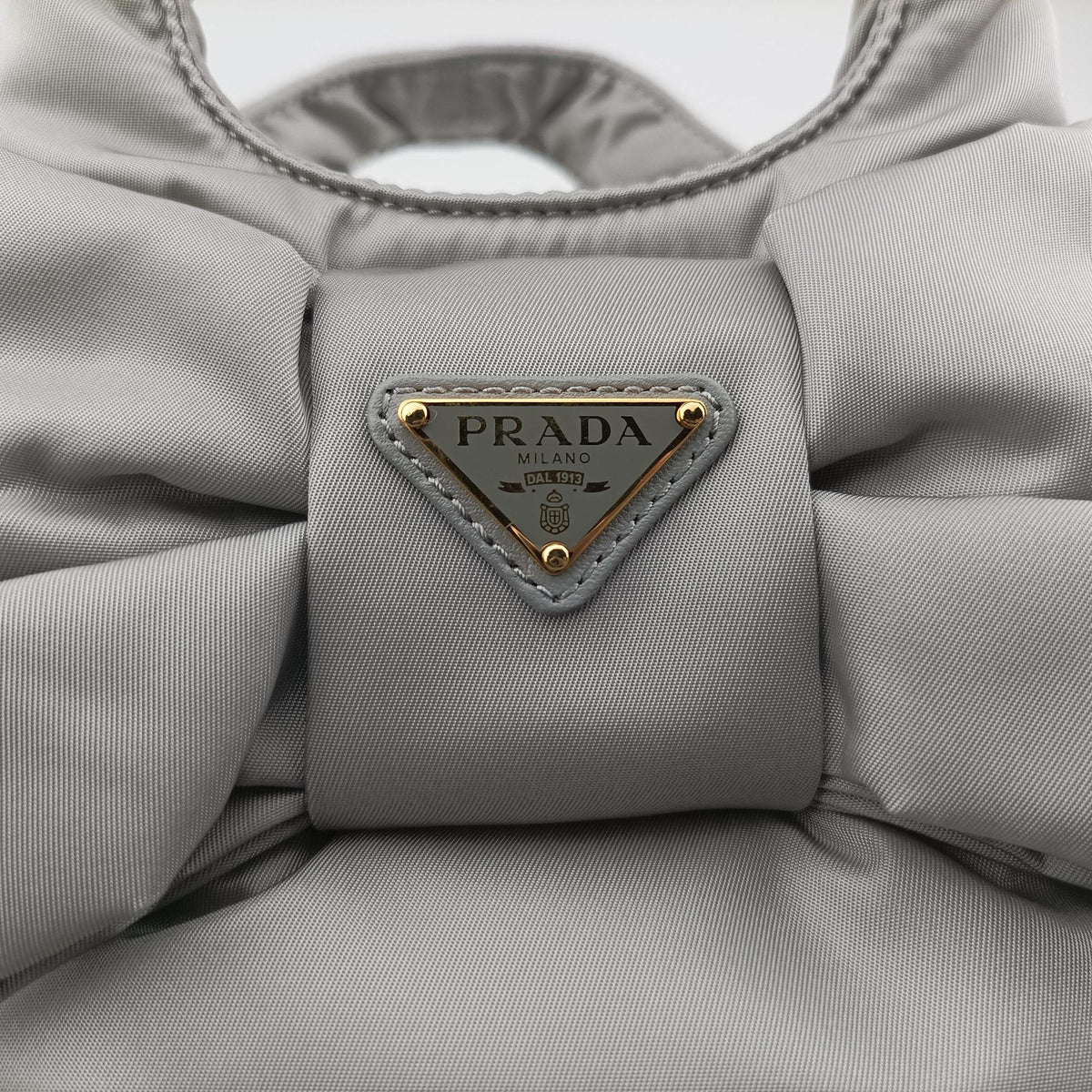 Secondhand Prada Ribbon Re-Nylon Grey Nylon 1BA359 shoulderbag | stylenewstar