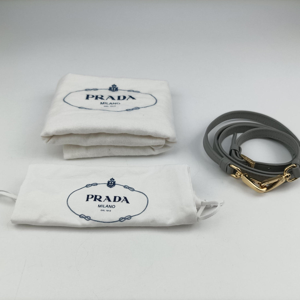 Secondhand Prada Ribbon Re-Nylon Grey Nylon 1BA359 shoulderbag | stylenewstar