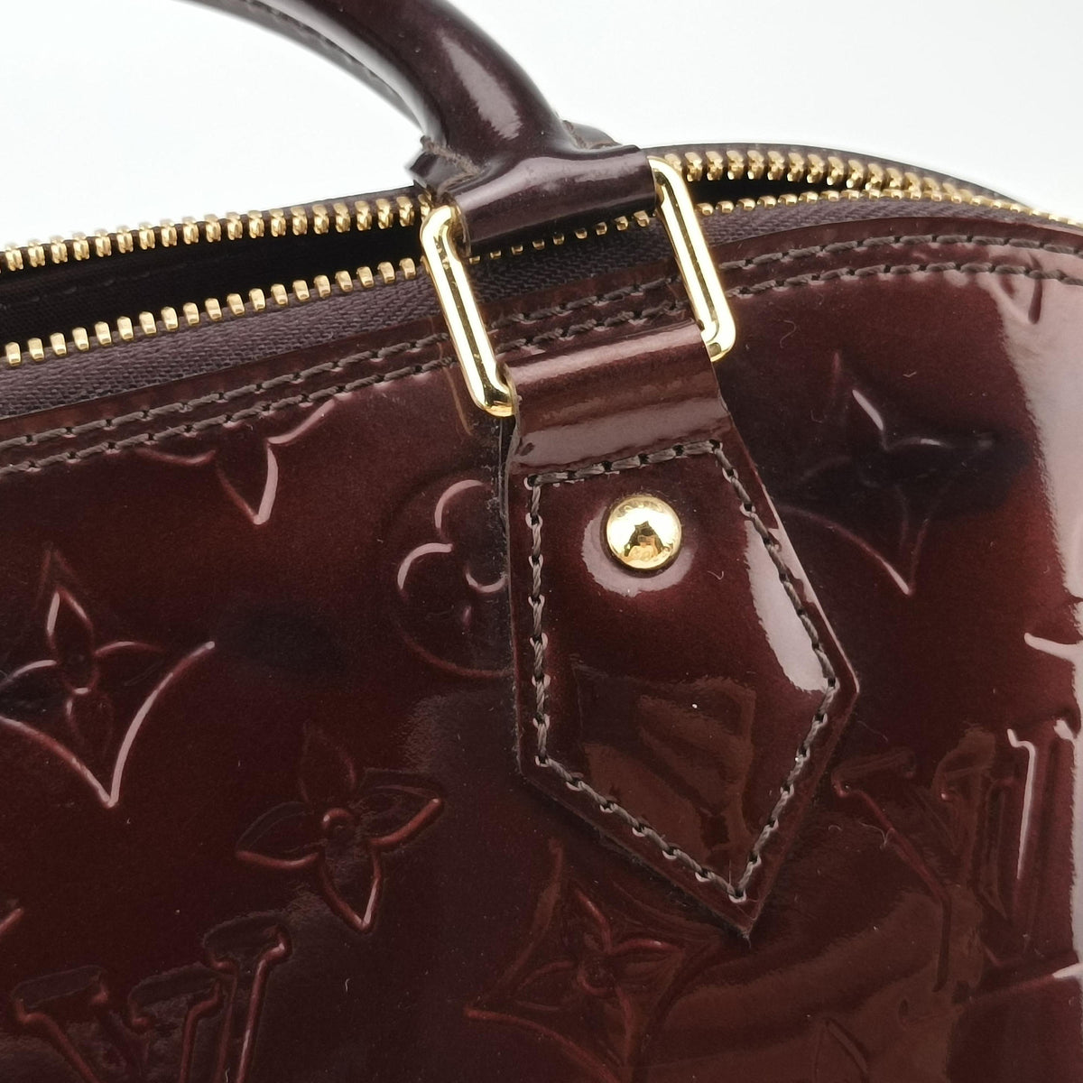 Vintage Louis Vuitton Alma PM Amarante Vernis M91611 handbag | stylenewstar
