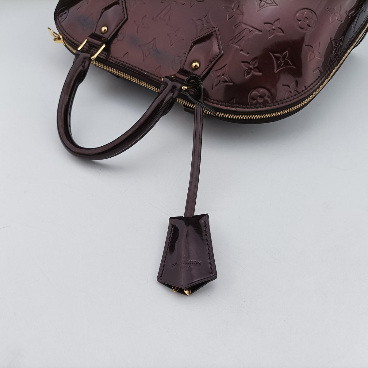 Vintage Louis Vuitton Alma PM Amarante Vernis M91611 handbag | stylenewstar